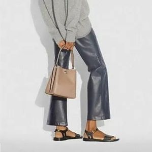 GET IT WHILE IT IS REDUCED!!NWOT Coach Charlie Bucket Bag Signature Canvas Taupe
